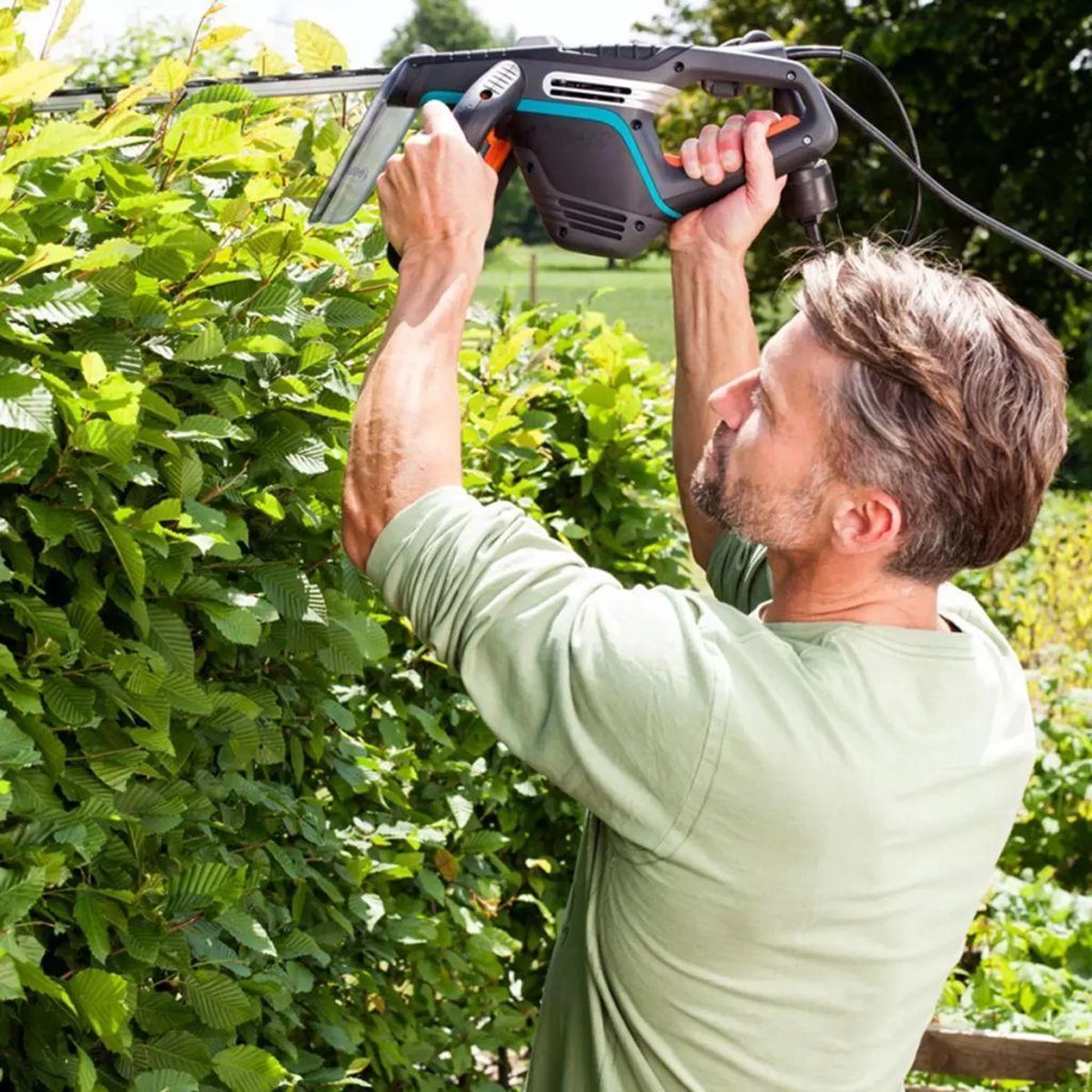 Taille-haie électrique GARDENA PowerCut 700/65 - 700 Watt - Longueur De La Lame 65 Cm 7 Taille-haie électrique GARDENA PowerCut 700/65 - 700 Watt - Longueur De La Lame 65 Cm – Image 5